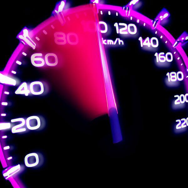 Image of a speedometer glowing read as the speed increases Image of a speedometer glowing read as the speed increases