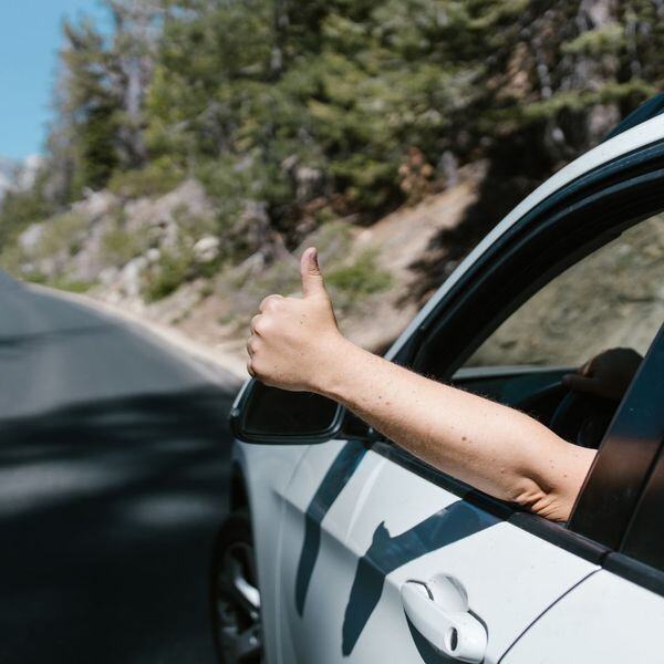 person giving thumbs up