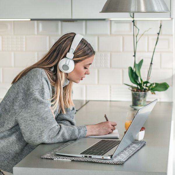 girl writing in notebook