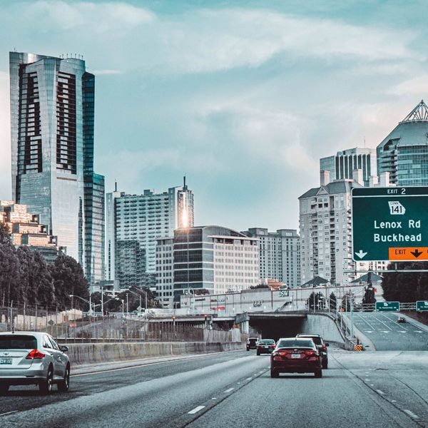 cars driving through city