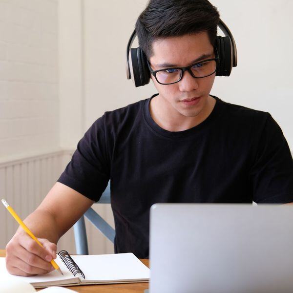 Online student taking notes