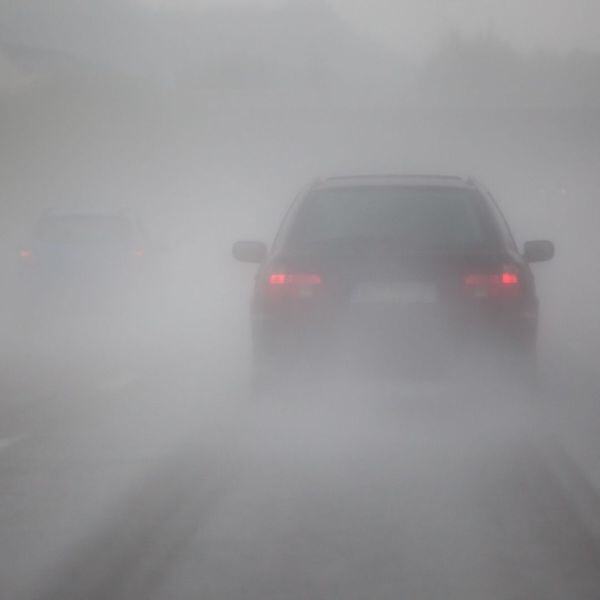 Car in heavy fog